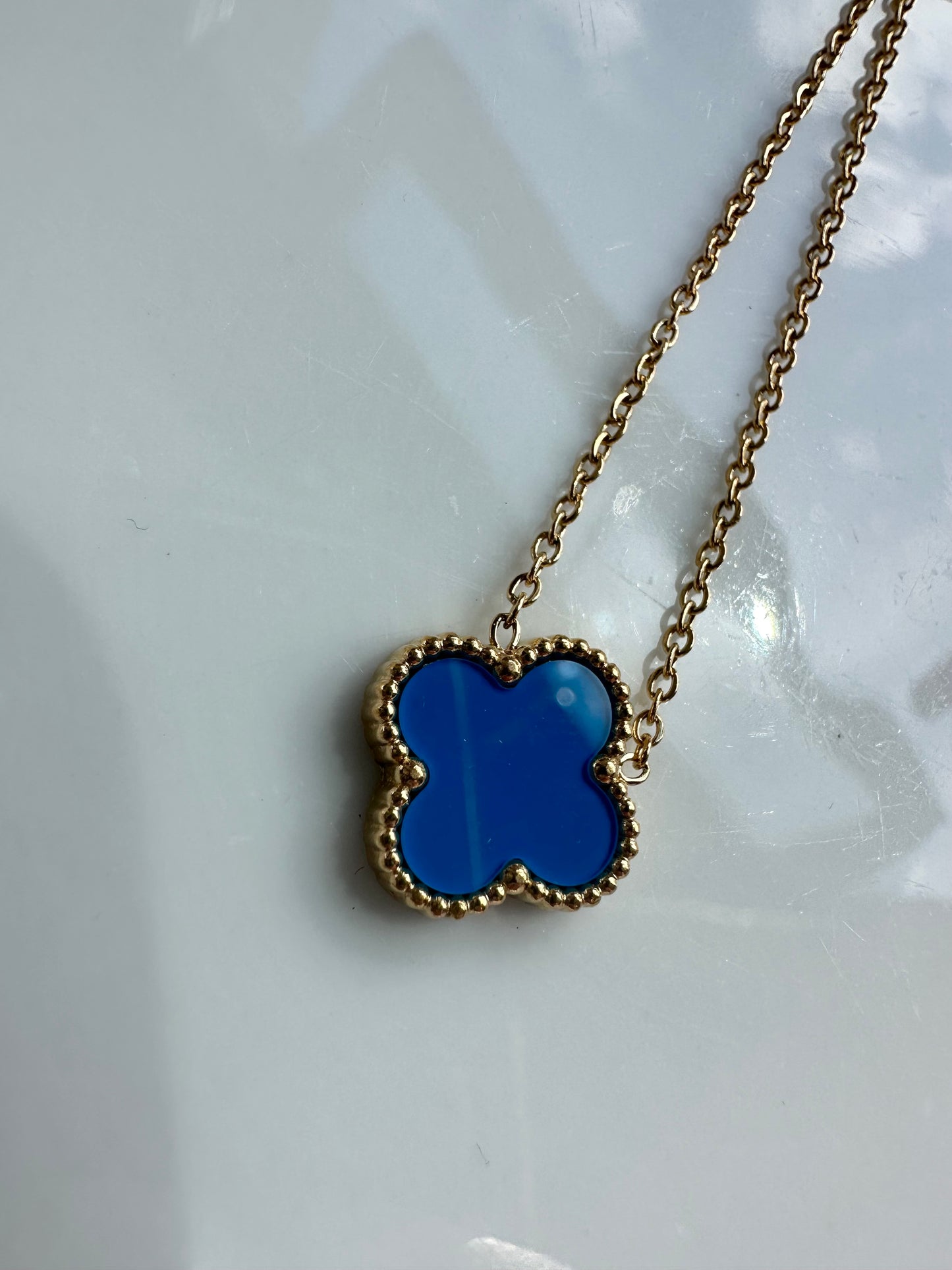 Blue clover necklace