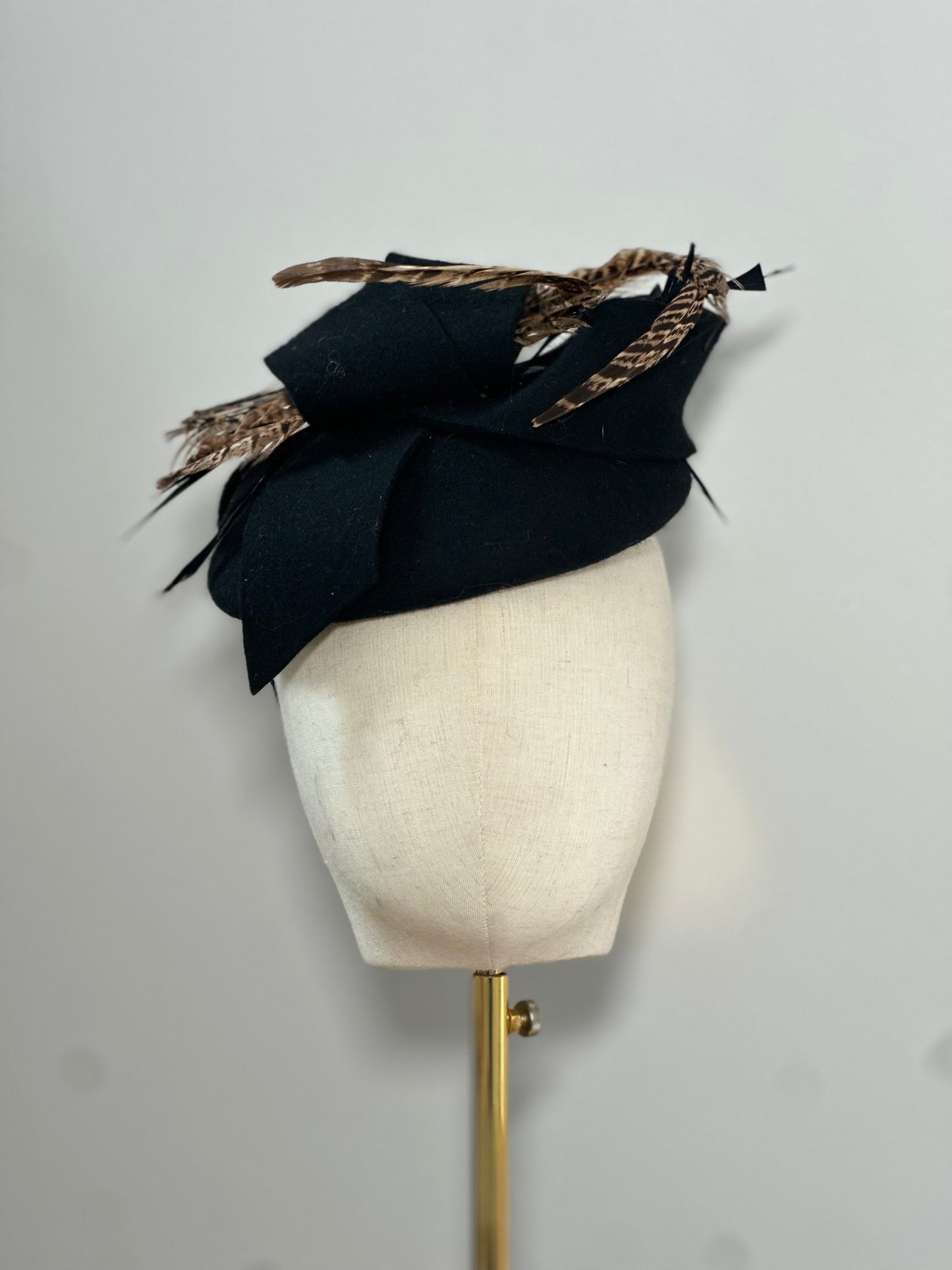 Black wool headpiece with pheasant feathers