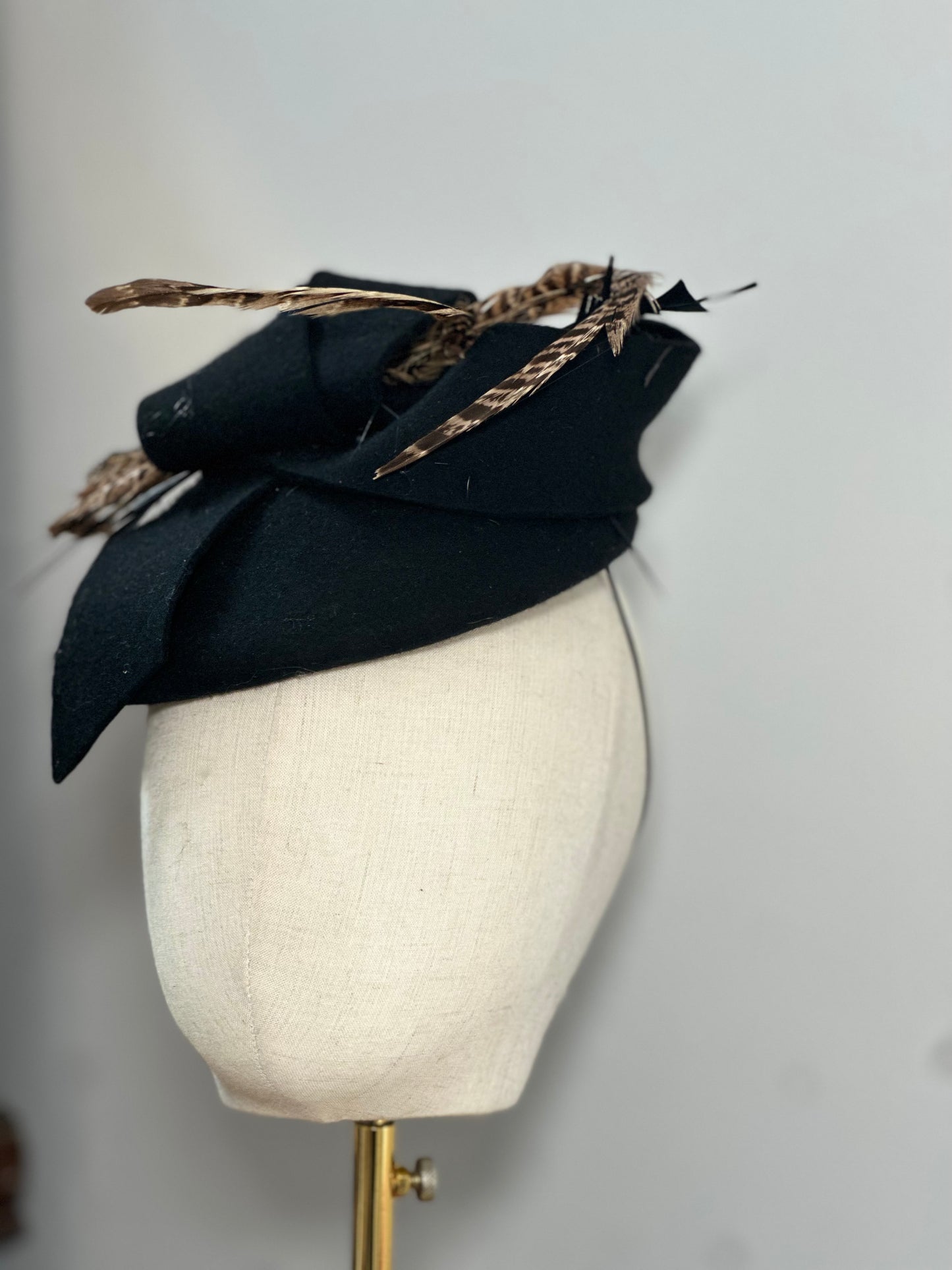 Black wool headpiece with pheasant feathers