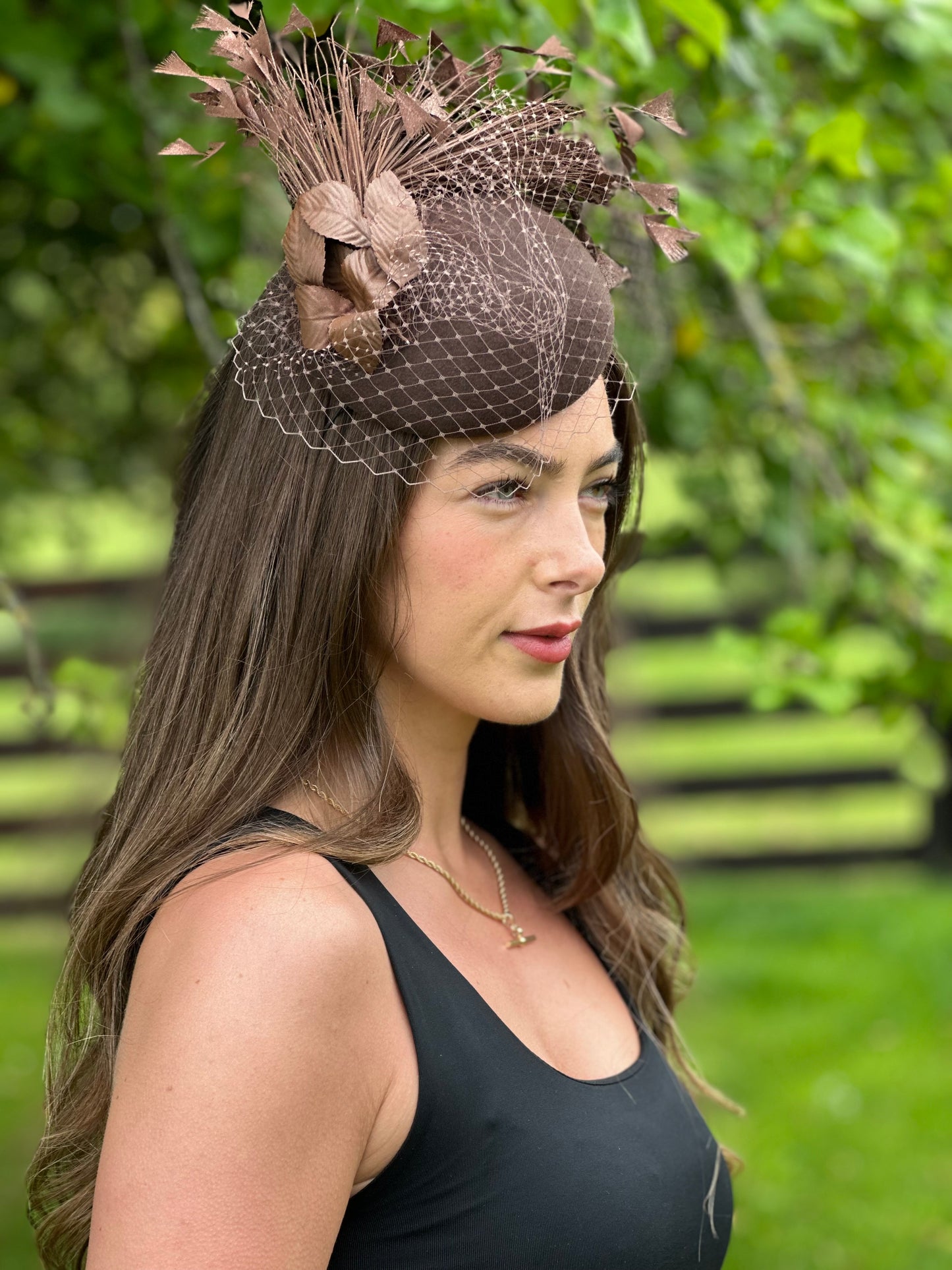 Brown wool base netted fascinator