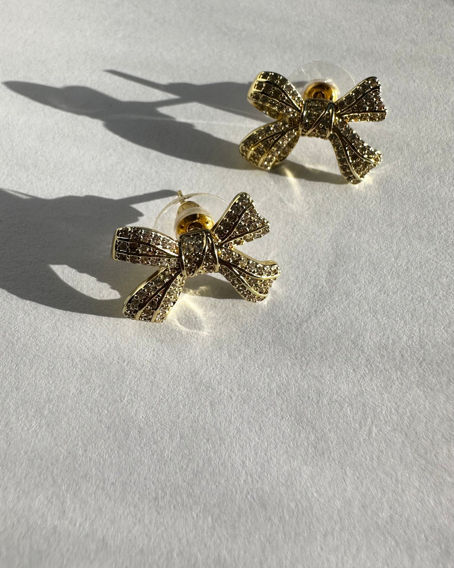 Gold bow earrings