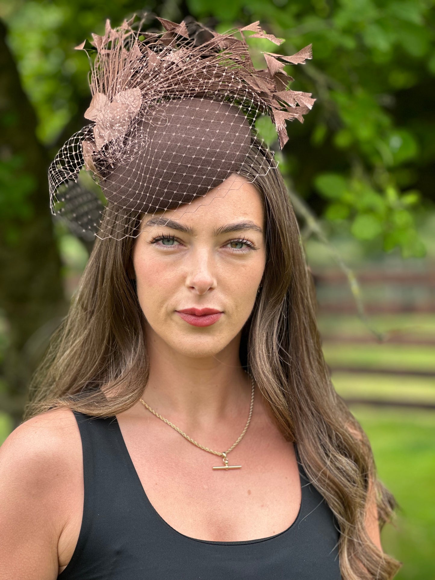 Brown wool base netted fascinator