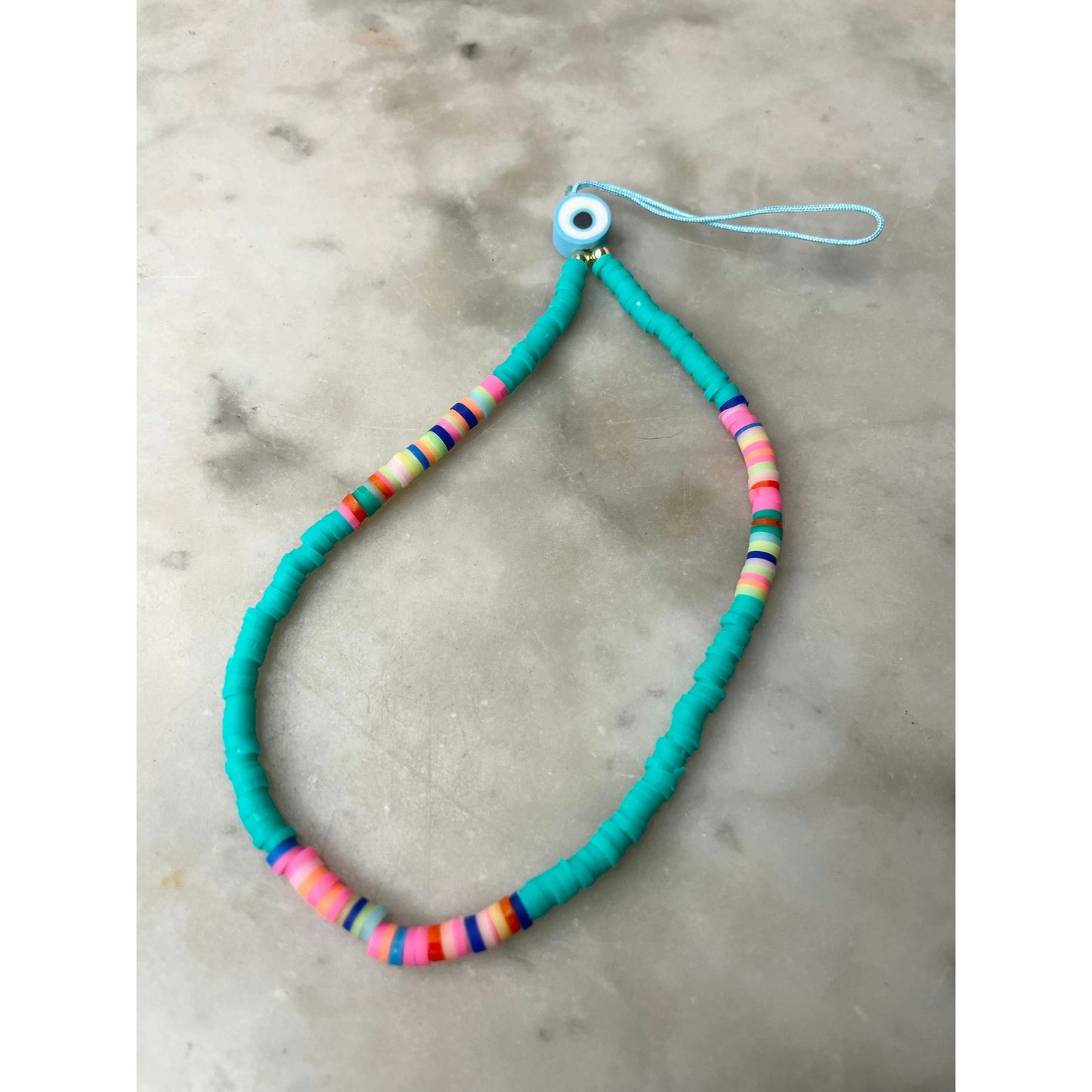 Green/ blue evil eye phone charm