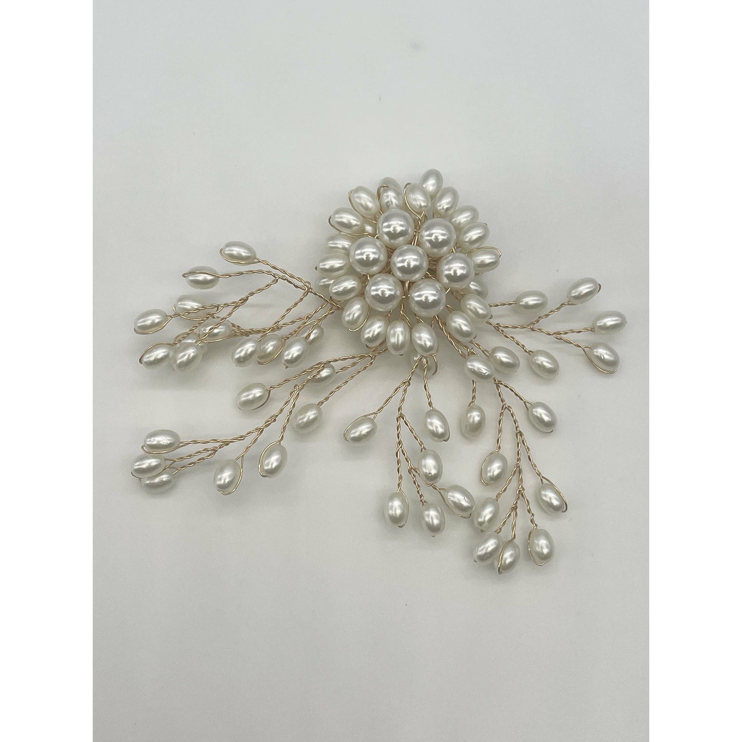 Scattered pearl brooch